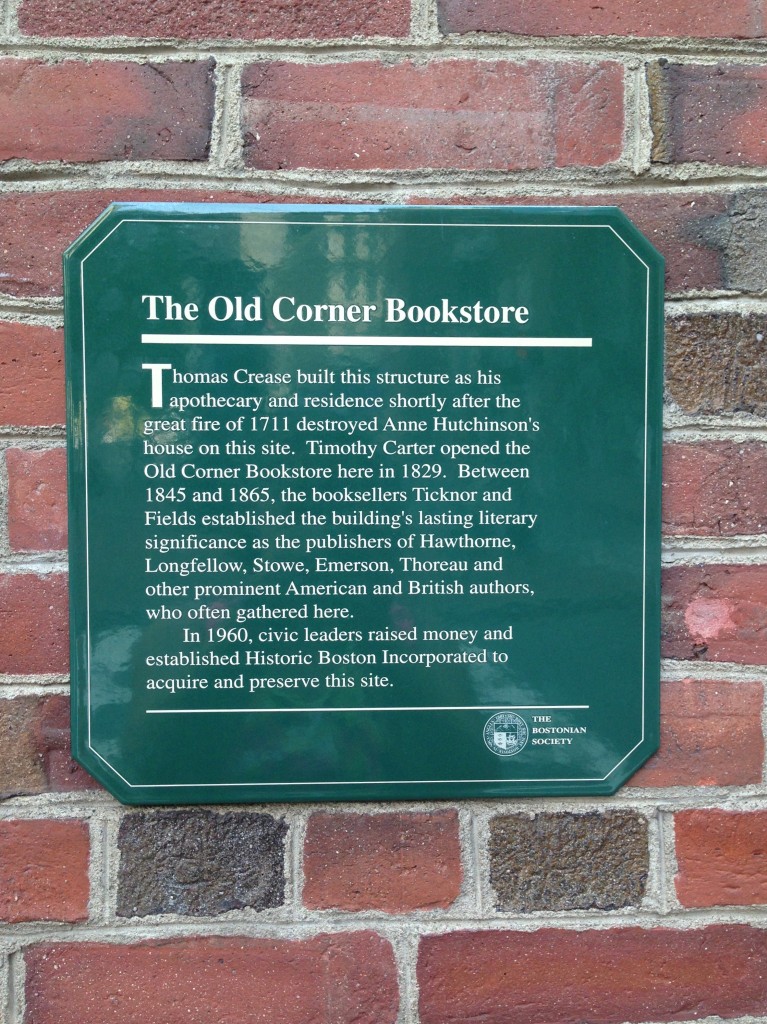The sign on the outside of the building, giving a brief history. 